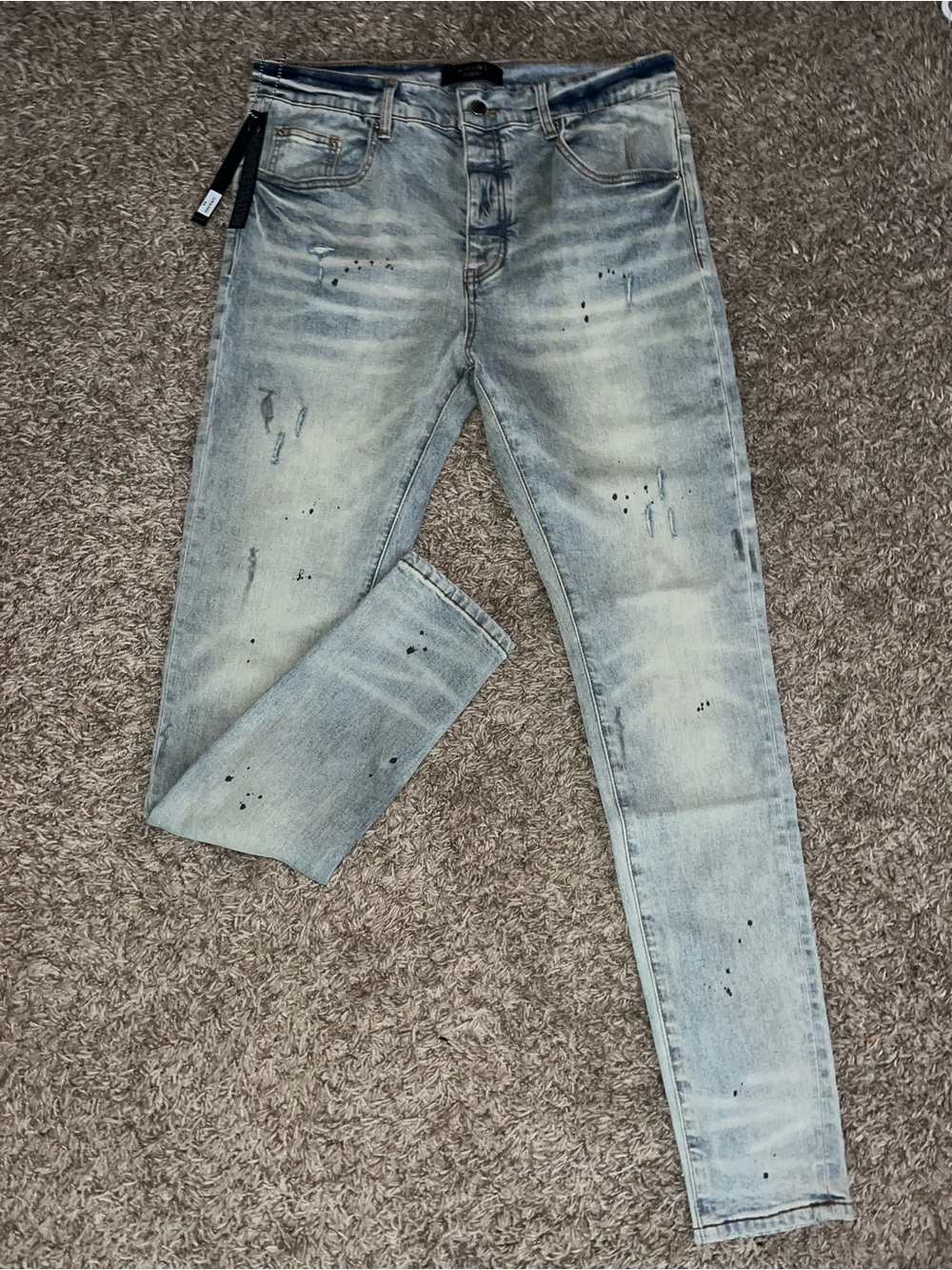 AMIRI Faded Light Blue Skinny Jeans with Paint-Splatter Detail